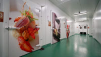 Newrest Group doors with food pictures on them